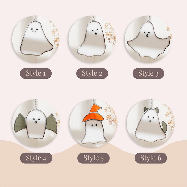 May include: Six different styles of stained glass ghost ornaments, each hanging from a silver chain. The ghosts are white with black facial features. Some ghosts have accessories like a witch hat or cat ears. The text "Style 1" through "Style 6" is below each ghost.