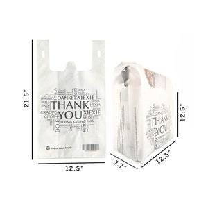 May include: White plastic shopping bag with handles. The bag is printed with the word "THANK YOU" in a circle of words in multiple languages. The bag measures 12.5 inches wide by 21.5 inches tall.