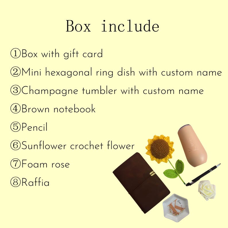 K&ouml;nnte beinhalten: Eine Auswahl an Artikeln, darunter ein braunes Notizbuch, eine geh&auml;kelte Sonnenblume, ein Champagnerbecher, ein Bleistift, ein sechseckiges Ringtablett und eine wei&szlig;e Schaumrose. Der Text "Box include" steht oben.