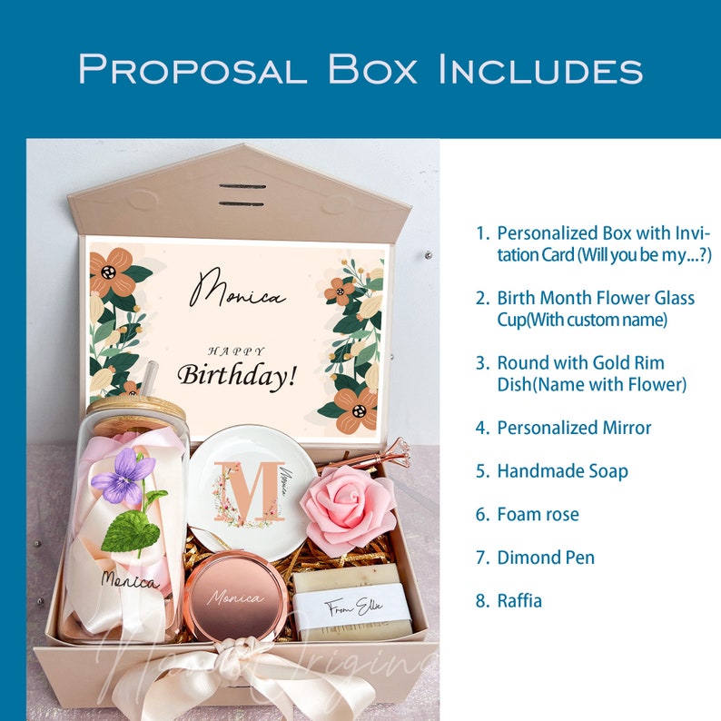 May include: A gift box with a personalized invitation card, glass cup, dish, mirror, soap, foam rose, pen, and raffia. The box includes a card that says "Happy Birthday!" and the name "Monica". The box is beige and has a ribbon.