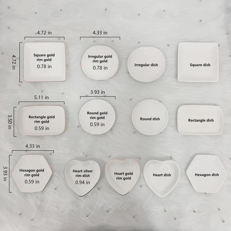 May include: A collection of white ceramic dishes in various shapes: square, irregular, round, rectangle, hexagon, and heart. Some dishes have gold rims. Measurements are in inches, with the largest square dish at 4.72 inches.