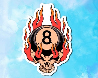May include: A black and white skull with flames coming out of the top. The skull is wearing a black and white eight ball as a hat.