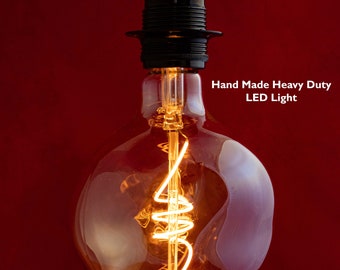 Edison LED-Lampe E27 Dimmbare Schraube Filament Retro Glühbirne mit Skulptur Kunst entwickelt schmelzförmiges bernsteinfarbenes Glas, 220V 6W (entspricht 50W)