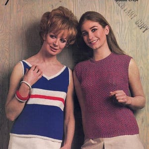 May include: Two women wearing sleeveless knit tops. The woman on the left is wearing a blue and white striped top with a red stripe. The woman on the right is wearing a pink top with a textured knit pattern. Both women are wearing white skirts. The image includes the text "Templeton's", "Acrilan", "Monsanto", "1549", "One Shilling", "32-40 ins", "Prismar", "Double Crepe", and "A.V.R. 1963".