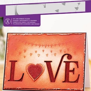 May include: A die-cutting and embossing folder for crafting. The folder features a design of the word "LOVE" with a heart in the center. The folder is 5 inches by 7 inches (13.2 cm by 5 cm).