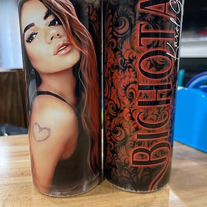 Karol G tumbler. Comes with lid and stainless steel straw. These are sublimated and dishwasher safe. Choose one or both.