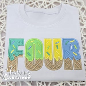 May include: A white t-shirt featuring the word FOUR embroidered in a colorful ice cream cone design. Each letter is styled as a waffle cone base with pastel green, yellow, and blue icing drips and multi-colored sprinkles. The text Maria's Kreations is visible.