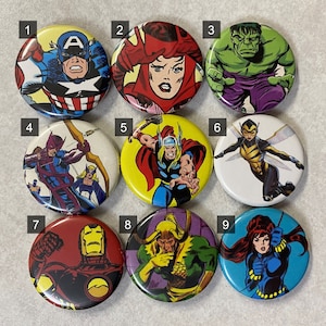 May include: Nine round buttons with different superhero characters. The buttons are numbered 1 through 9. The characters include Captain America, Scarlet Witch, Hulk, Hawkeye, Thor, Wasp, Iron Man, Loki, and Black Widow.