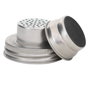 May include: A set of three stainless steel lids for mason jars. The lids have a strainer, a solid lid, and a regular lid.