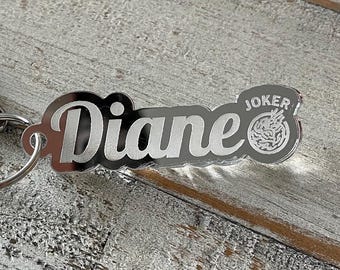 Llavero de Mahjong personalizado. Grabado con nombre, frase y ficha a elegir. Se muestra el Joker.