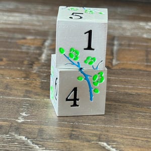 Mahjong pair of Flower Dice in organza bag. silver and green