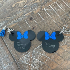 The one engraved Custom cheer Bag tags, two sides, can also do other comps, Quest, D2, Summit, regional summit, youth summit