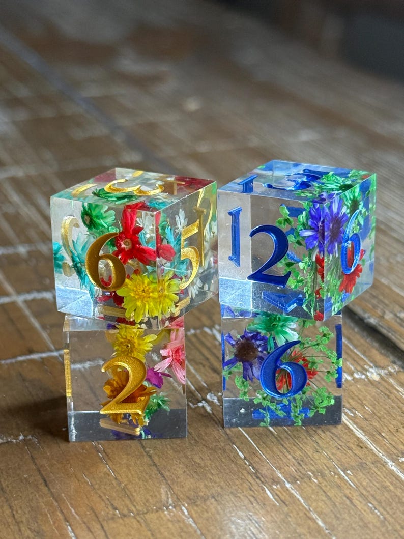 gold paint is clear flower, the blue paint has a blue tint and is called new flower