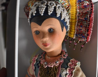 Czech doll in a complex national costume