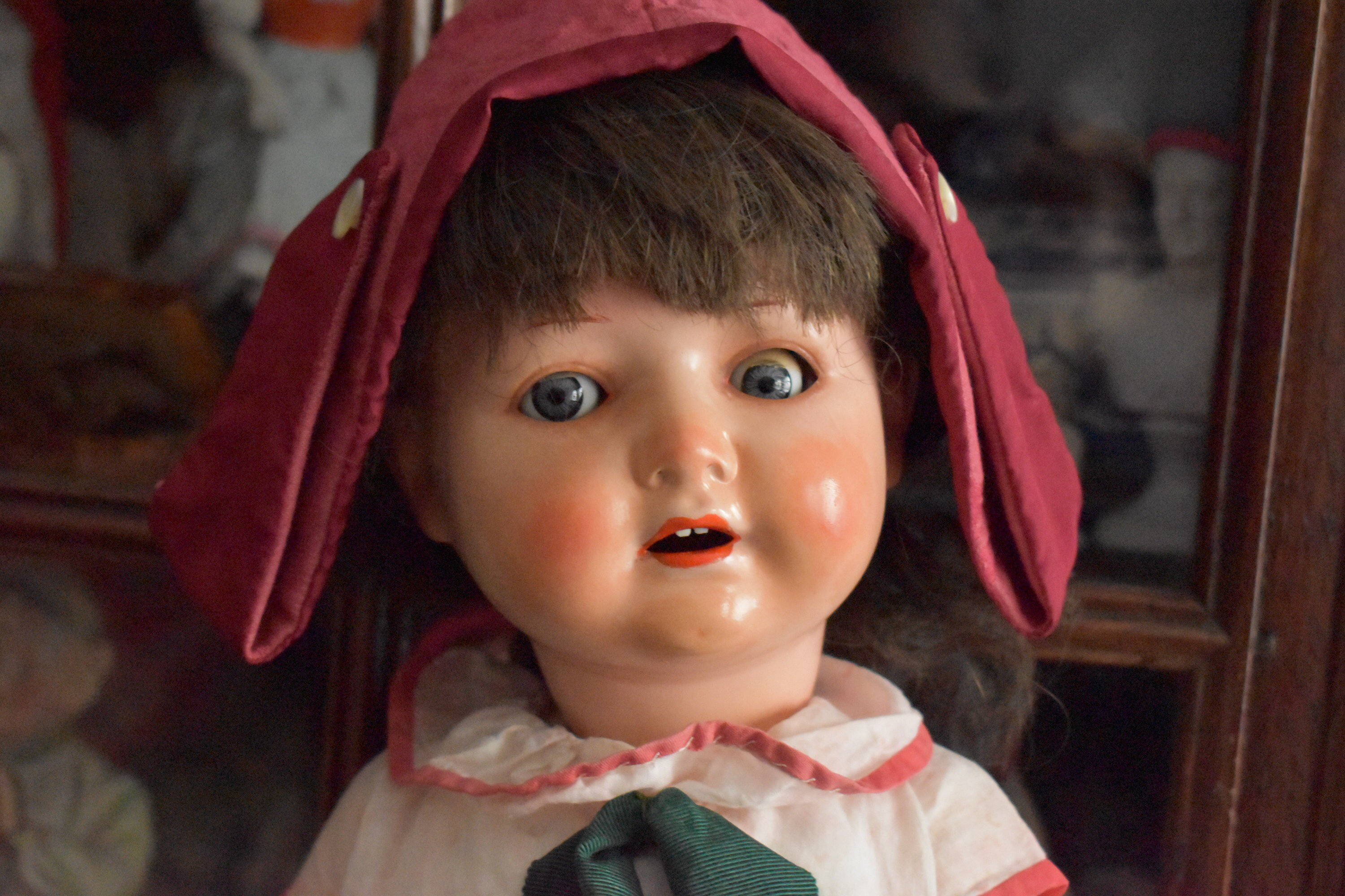 A Heubach Koppelsdorf bisque head doll, impressed '342.7', with brown wig, closing blue ey