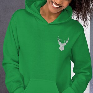 May include: A green hooded sweatshirt with a white embroidered deer head on the left chest.