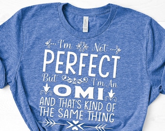 May include: A blue t-shirt with white text that reads "I'm not perfect but I'm an Omi and that's kind of the same thing".