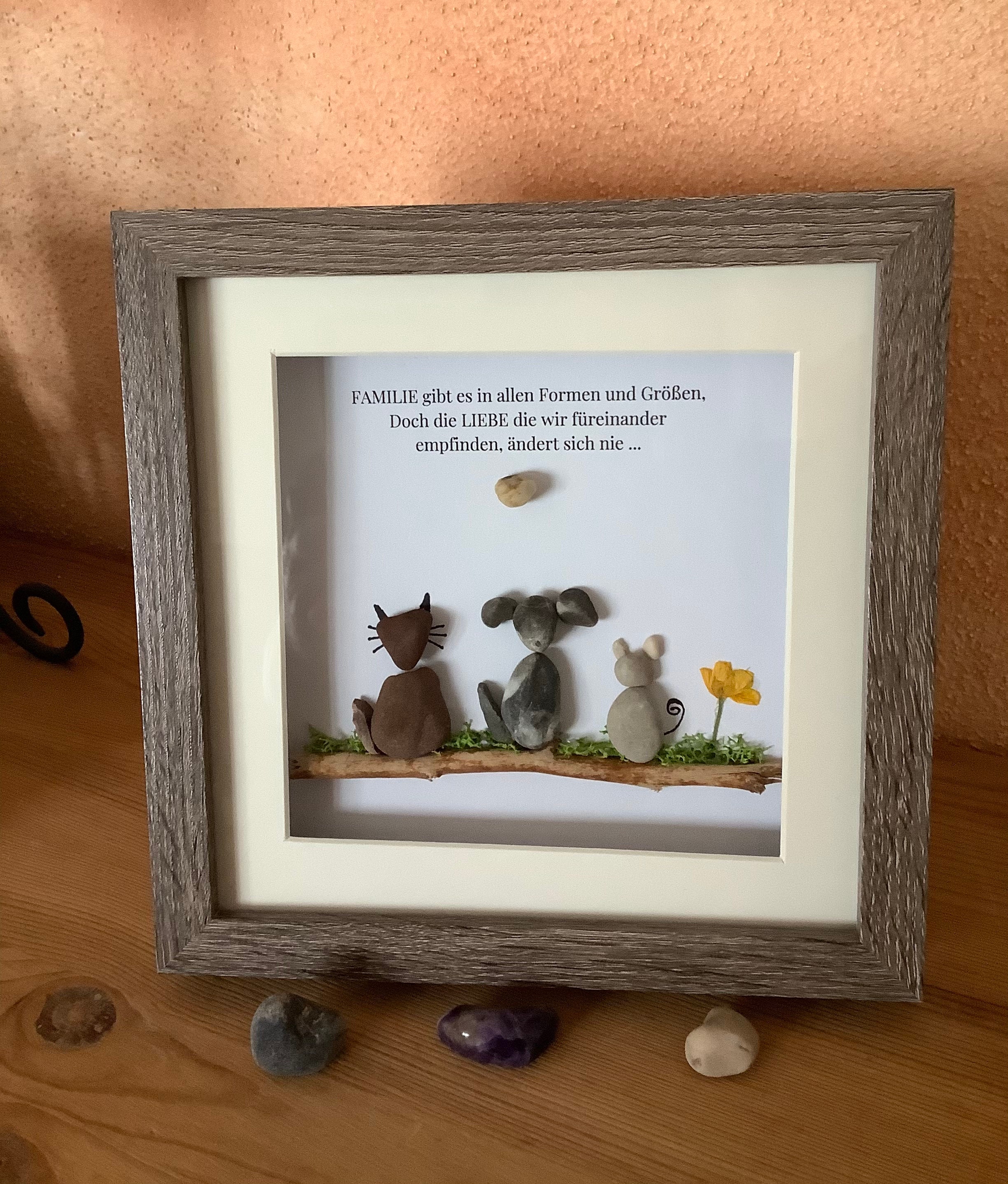 steinbild familie mit hund