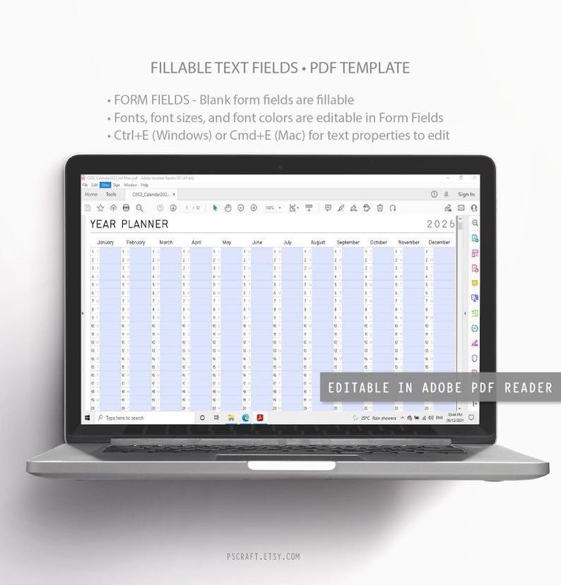 May include: A laptop displaying a 2026 year planner template. The screen shows a grid with months and dates, designed for fillable text fields. Text on the screen includes "YEAR PLANNER" and "EDITABLE IN ADOBE PDF READER".