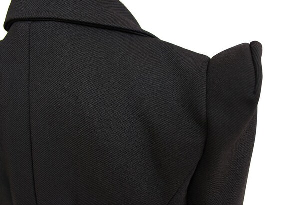 Blazer with cheap pointed shoulders