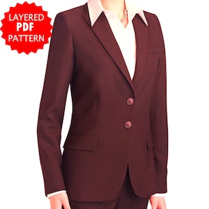 May include: A maroon blazer with a three-button closure and a single pocket on each side.