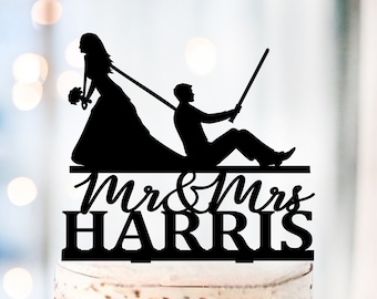 Lightsaber Wedding Cake Topper, Bride dragging groom wedding cake topper, Space Inspired Cake Topper, Bride and Groom Nerd Wedding Topper