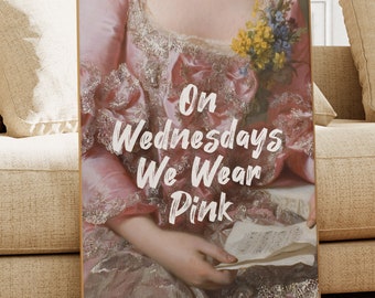May include: A vintage-style painting of a woman wearing a pink dress with lace trim. The text "On Wednesdays We Wear Pink" is superimposed on the image.