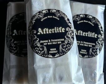 May include: Three soy wax melt bars in white paper packaging. Each bar has a black circular label with the text "Afterlife" and "Jasmine & Frankincense Soy Wax Melt Bar". The labels also state "Vegan Friendly".