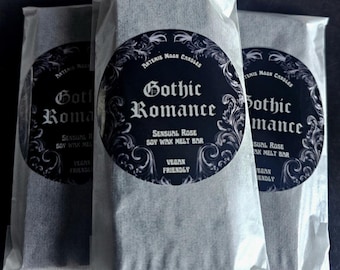May include: Three white, opaque, plastic bags with black labels. The labels have a black and white gothic design and the text "Artemis Moon Candles Gothic Romance Sensual Rose Soy Wax Melt Bar Vegan Friendly".