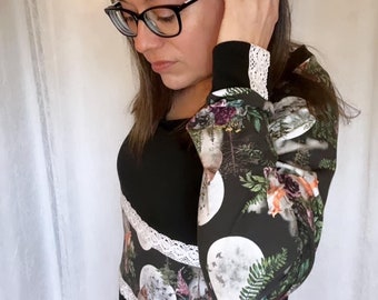Free delivery eligible see in description. Black tunic with floral, animal and lace print. Remaining size (L/XL)