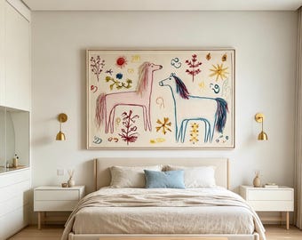 May include: A large rectangular framed wall art piece featuring a whimsical illustration of a pink horse and a blue horse surrounded by colorful hand-drawn botanical and celestial motifs on a cream background, displayed above a neutral bed.