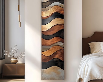 May include: A tall, rectangular wall art piece with a series of layered, wavy shapes in gold, bronze, black, and brown tones. The artwork has a textured finish and is mounted on a neutral wall, providing a modern decorative element.