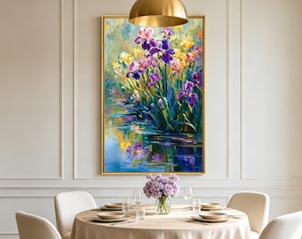 May include: A rectangular oil painting in a gold frame depicting a vibrant garden of purple, yellow, and blue irises reflected in a calm body of water. The artwork features thick, textured brushstrokes and a rich color palette of floral tones.