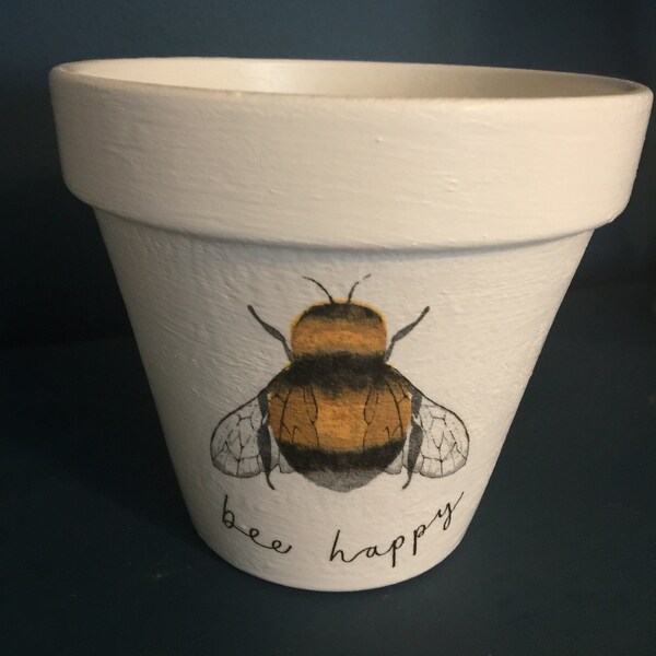 Bee Happy. Hand decorated plant pot and saucer with bumblebee design.