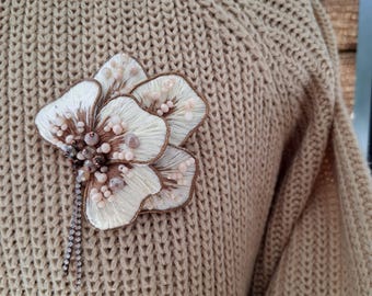 Handmade flower brooch made from natural materials