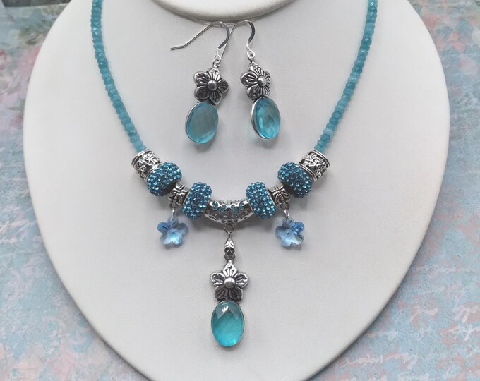 Blue Topaz Flower Charm Necklace and Earrings, 17to21 inch Adjustable Gem & Crystal Necklace with Matching Sterling Ear Wire Flower Earrings