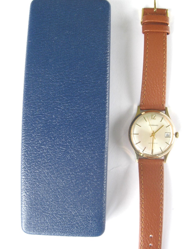 1976 Garrard Automatic Date Wristwatch in solid 9ct Gold with Original Box and papers