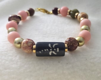 Beaded Single Strand Bracelet Pink gold and hand painted wooden accent beads