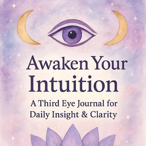 May include: A journal cover with the text "Awaken Your Intuition" above the text "A Third Eye Journal for Daily Insight & Clarity." The cover features a purple lotus flower, a purple eye, and two golden crescent moons against a watercolor background.