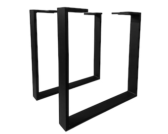 Könnte beinhalten: Zwei schwarze Metalltischbeine in quadratischer Form. Die Beine sind oben und unten miteinander verbunden und bilden eine Einheit.