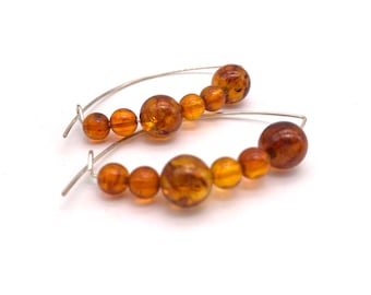 Pendientes de ámbar con bolitas: pendientes de ámbar natural hechos a mano con ámbar báltico y ganchos de plata de ley 925.
