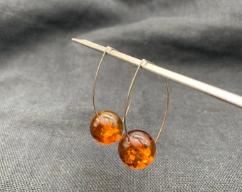 Pendientes de ámbar y coñac, bola de plata