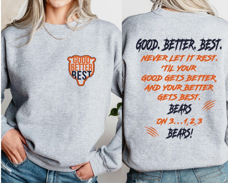 May include: A grey sweatshirt with the words "GOOD BETTER BEST" in a bear-shaped design on the front. The back of the sweatshirt features the phrases "GOOD. BETTER. BEST. NEVER LET IT REST" and "BEARS ON 3...1,2,3 BEARS!"