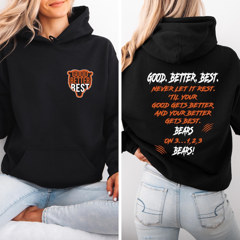May include: Black hoodie with a front pocket and a hood. The front features the text "GOOD BETTER BEST" inside a bear-shaped design. The back displays the text "GOOD. BETTER. BEST. NEVER LET IT REST...BEARS ON 3...1,2,3 BEARS!" in orange and white.