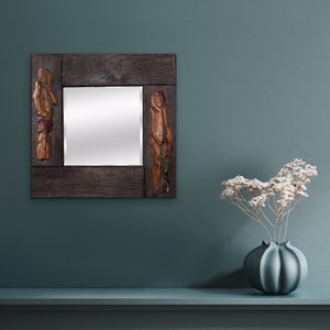 Mirror in frame, wooden relief with carved figures, Berlin 1980