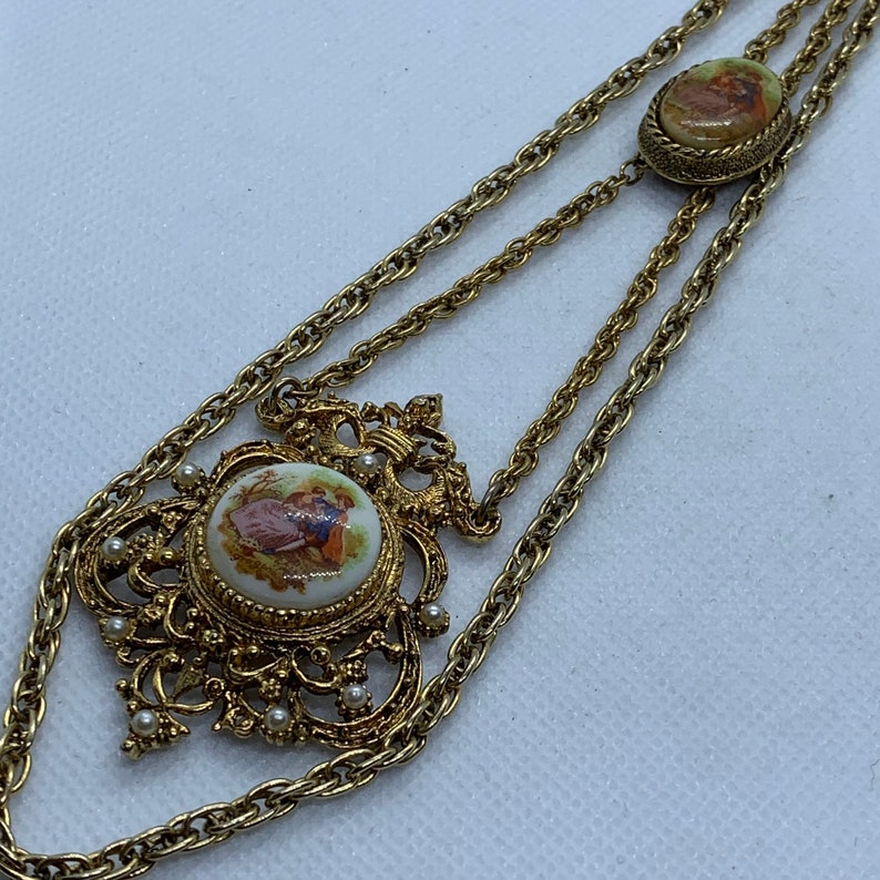 Vintage Two Strand Gold Tone Necklace with One Pendant Which Has A 1800/'s Scene On ChinaPorcelain Longest Strand is 16 inches when hanging