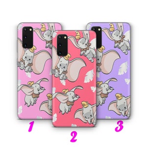 May include: Three phone cases with different colored backgrounds featuring a pattern of Dumbo the flying elephant. The cases are pink, red, and purple.