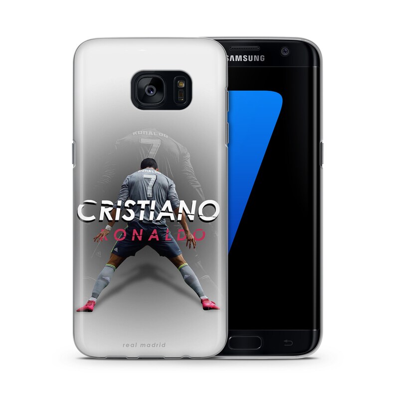 May include: A clear phone case with a photo of Cristiano Ronaldo playing soccer. The case has the text "Cristiano Ronaldo" and "real madrid" printed on it.