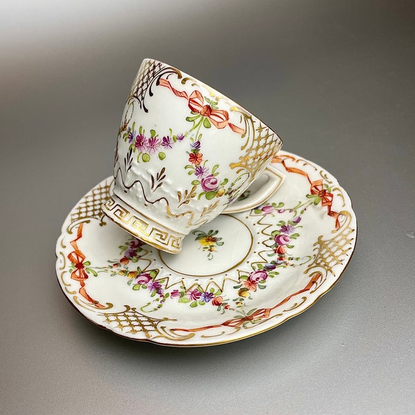 Pretty, antique Franziska Hirsch Dresden demitasse cup and saucer, ribbons and flowers