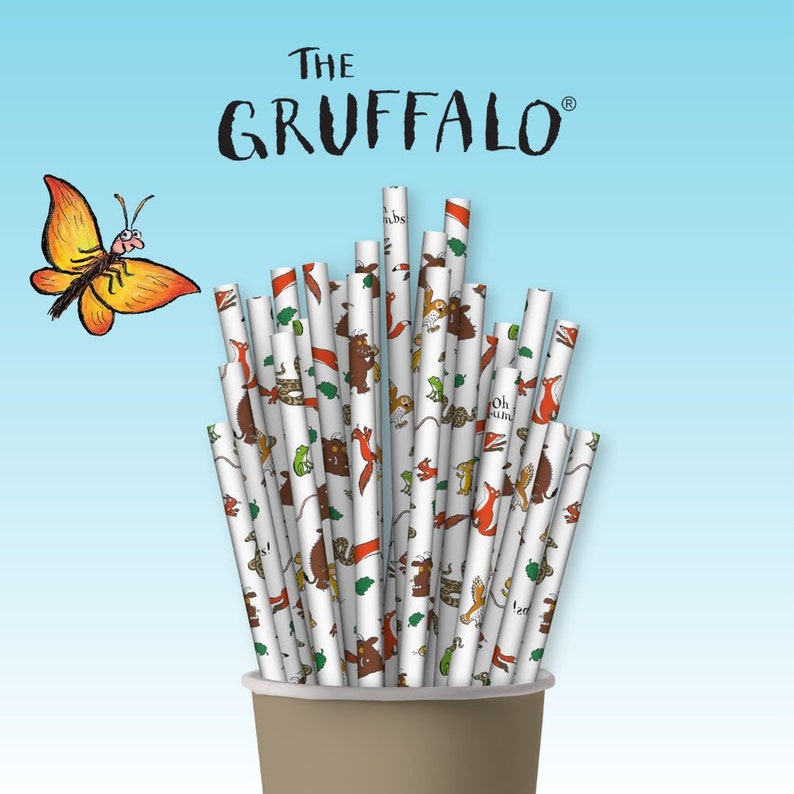 May include: A bundle of white paper straws with colorful illustrations of characters and animals from the children's book "The Gruffalo". The straws are in a brown paper cup.